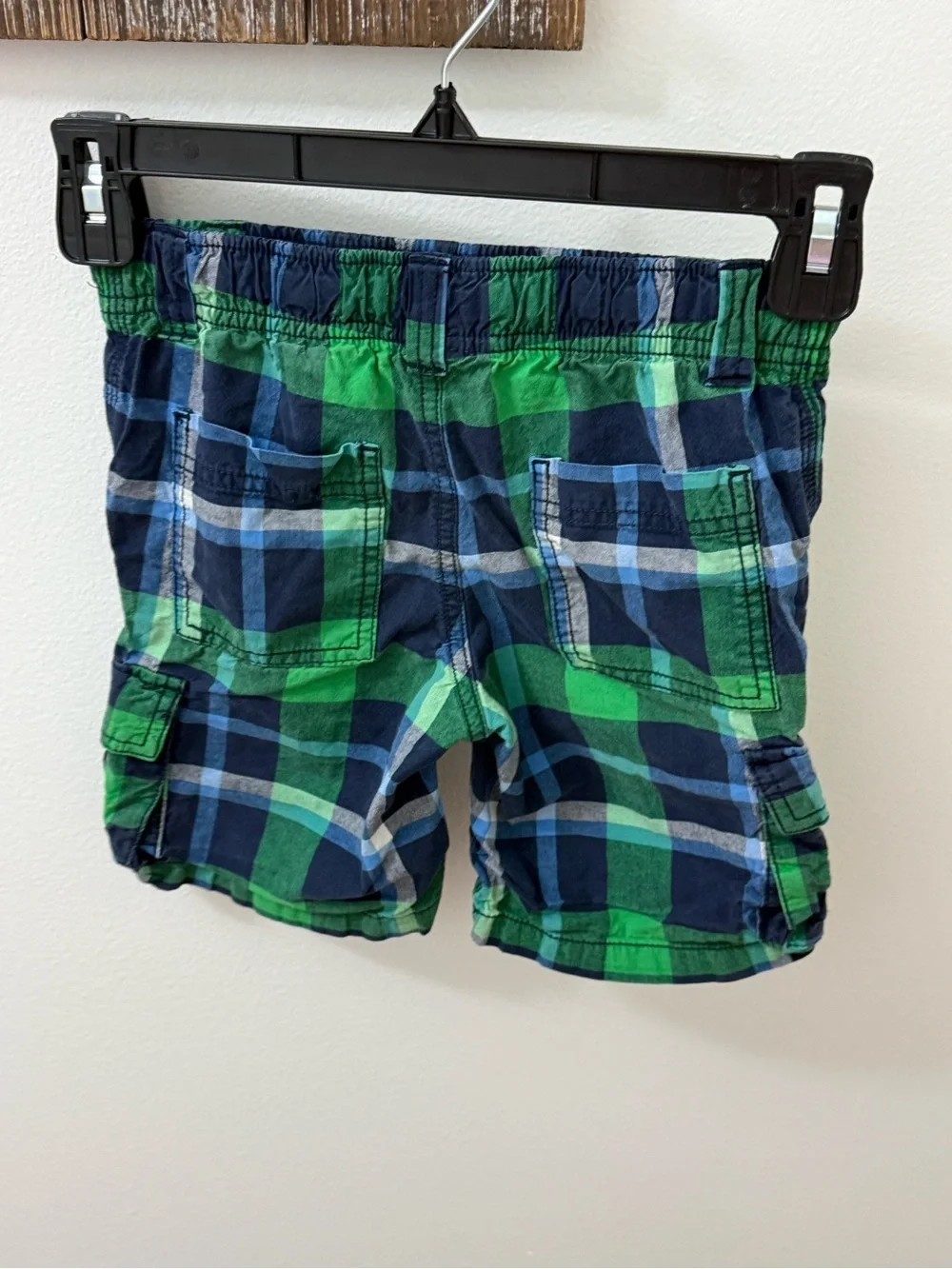 Gymboree boys green and navy blue plaid cargo shorts with an elastic waistband.